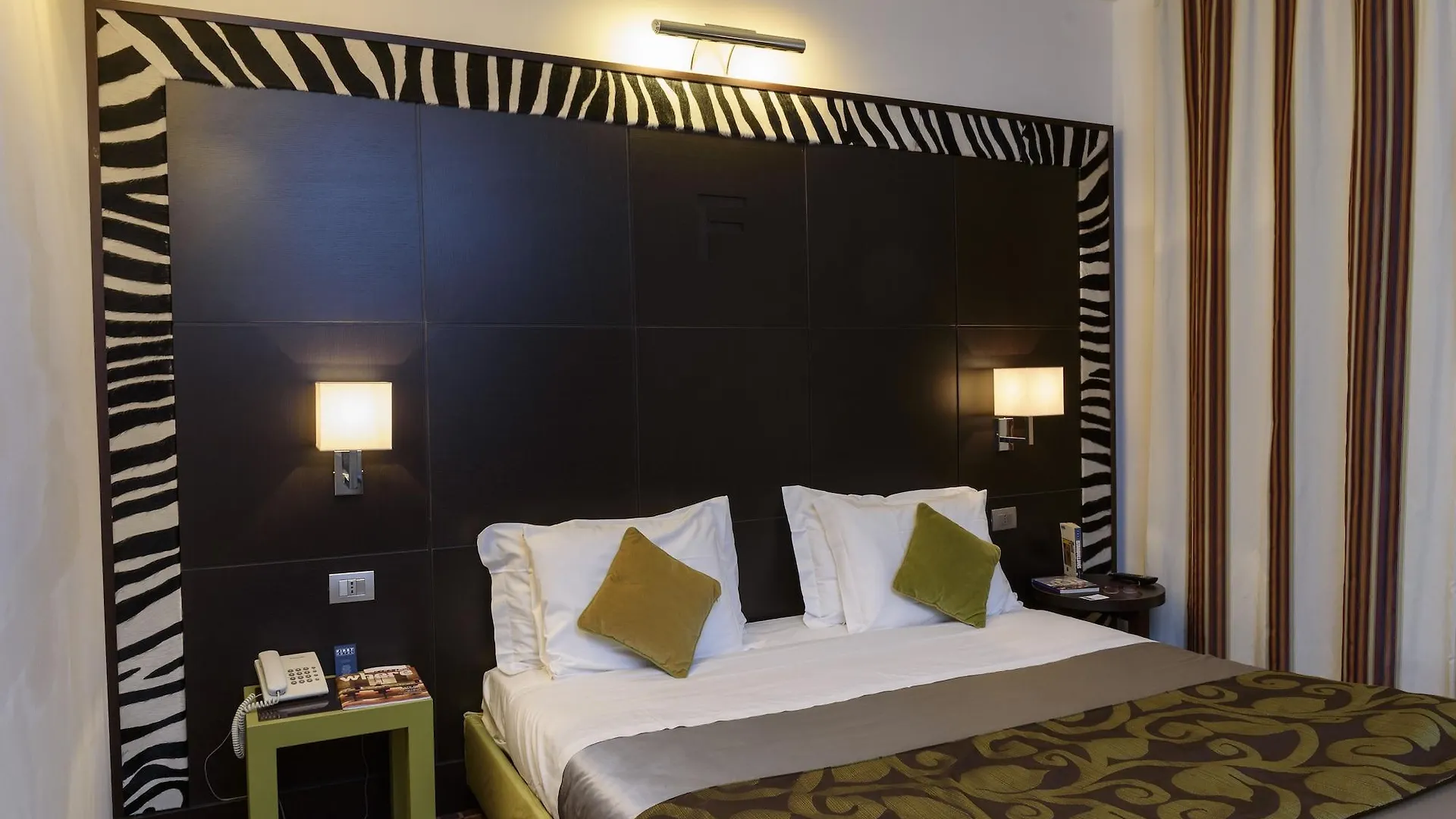 First Hotel Malpensa Κάζε Νουόβε 4*,